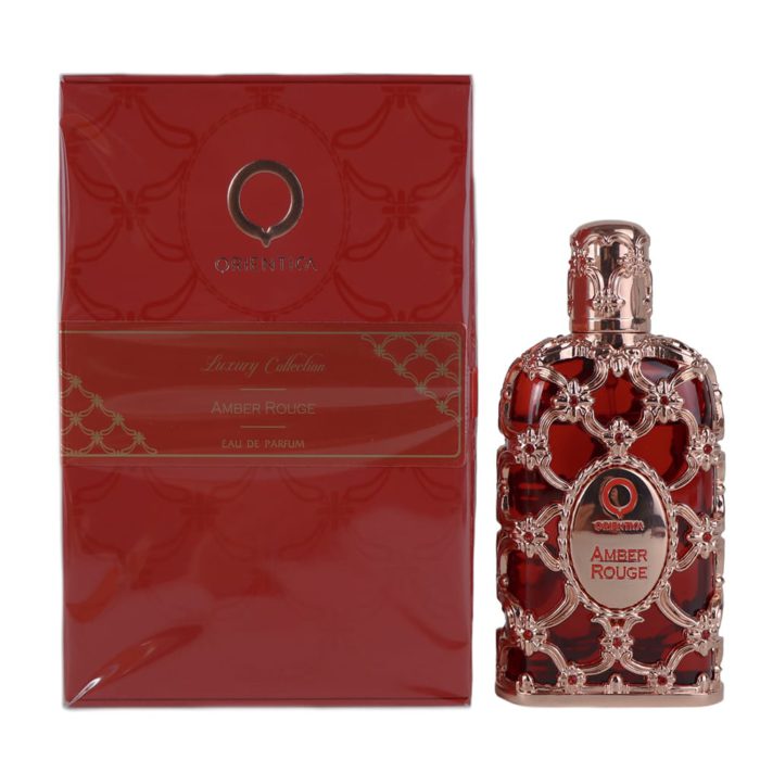 Amber Rouge Eau de Parfum by Orientica, featuring a luxurious red glass bottle with intricate rose gold detailing, paired with a matching red box.
