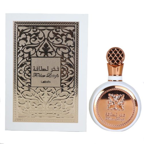 A white perfume bottle with rose gold accents and intricate detailing, alongside matching packaging with an elegant Arabic-inspired design labeled "Fakhar Lattafa."