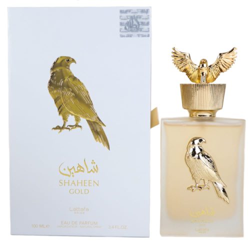 Shaheen Gold Eau de Parfum by Lattafa, featuring a luxurious gold bottle adorned with a falcon emblem and matching cap, paired with an elegant white and gold box.