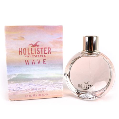Hollister Wave Eau de Parfum 100ml for women, featuring a round transparent bottle with a pink hue and a silver cap, next to a beach-themed packaging.