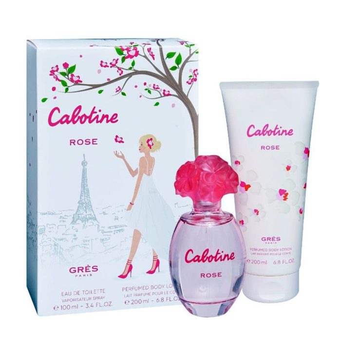 Cabotine Rose gift set by Grès Paris – includes a 100 ml eau de toilette with floral cap and a 200 ml perfumed body lotion, next to a Paris-themed box.
